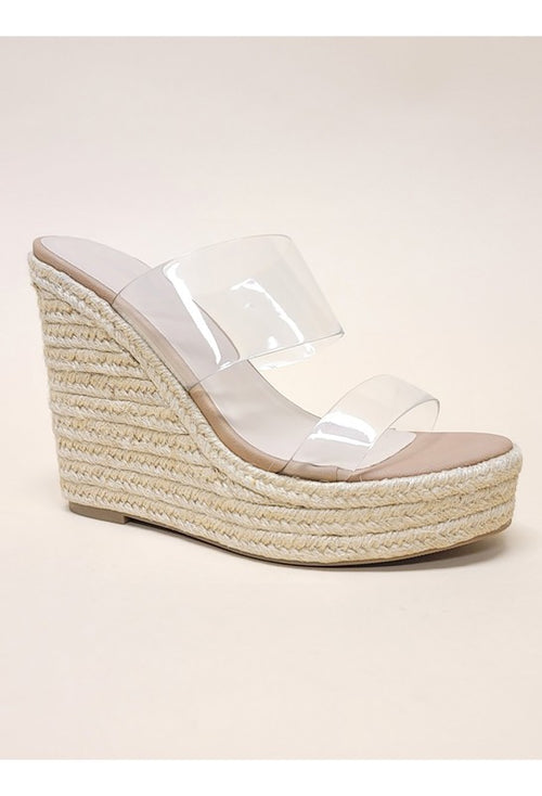 Opulence Unleashed: Luxe PVC Wedges