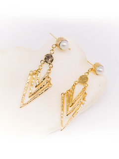 Opulent Pearl Earrings: Divine Elegance, Radiant Strength.