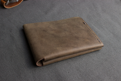 Buck Bifold: Crafted Elegance for Modern Gentlemen.