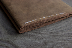 Buck Bifold: Crafted Elegance for Modern Gentlemen.