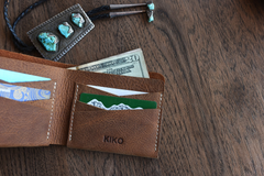 Buck Bifold: Crafted Elegance for Modern Gentlemen.