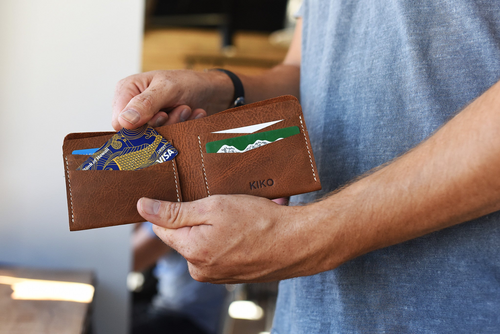 Buck Bifold: Crafted Elegance for Modern Gentlemen.