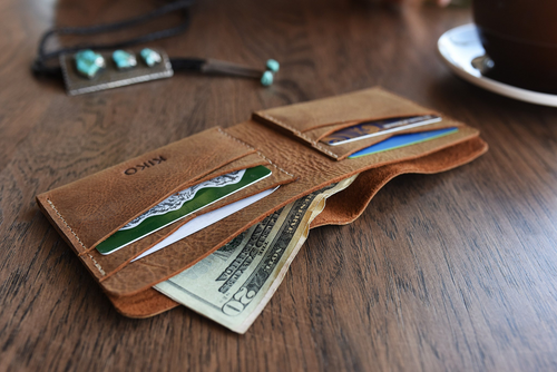 Buck Bifold: Crafted Elegance for Modern Gentlemen.