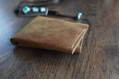 Buck Bifold: Crafted Elegance for Modern Gentlemen.