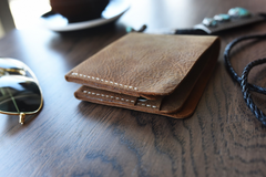 Buck Bifold: Crafted Elegance for Modern Gentlemen.