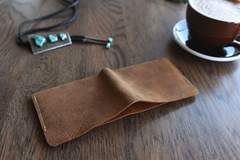 Buck Bifold: Crafted Elegance for Modern Gentlemen.