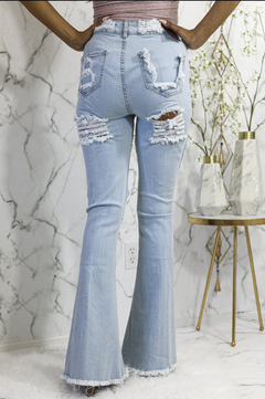 Slay All Day in Distressed Flare Jeans! 😍