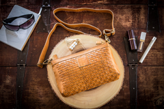 The Weaved Leather Crossbody: Luxury's Elegance