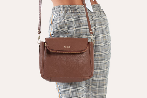 Genuine Pebble Leather Crossbody: A Luxury Tale.