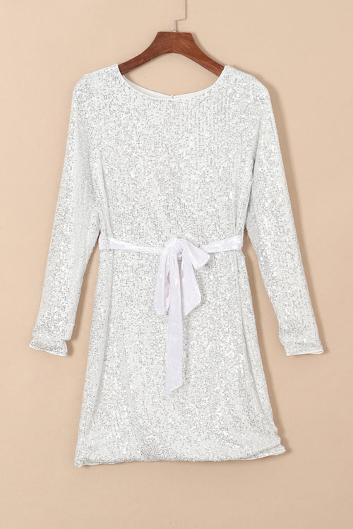 Sequin Elegance Mini Dress: Radiate Opulent Sophistication.