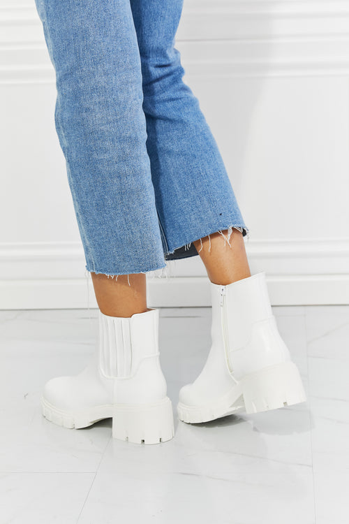 Prime Luxury: White Faux Patent Leather Boots