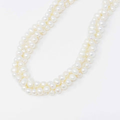 Opulent Pearl Elegance: Triple Strand Necklace