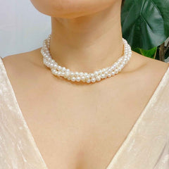 Opulent Pearl Elegance: Triple Strand Necklace