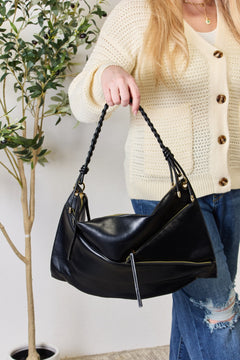 The Braided Strap Shoulder Bag: An Elegantly Functional Masterpiece