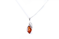 Amber Elegance: Sterling Silver Luxury Pendant