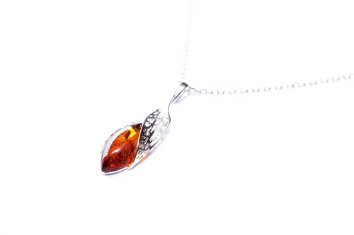 Amber Elegance: Sterling Silver Luxury Pendant