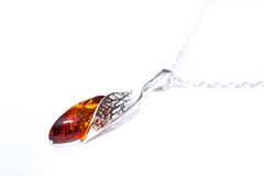 Amber Elegance: Sterling Silver Luxury Pendant