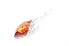 Amber Elegance: Sterling Silver Luxury Pendant