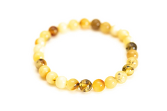 Opulent Amber Sphere Bracelet: Baltic Elegance