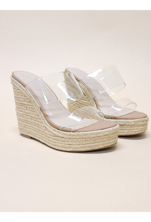 Opulence Unleashed: Luxe PVC Wedges