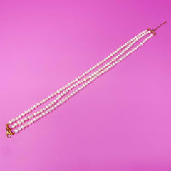 Opulent Pearl Elegance: Triple Strand Necklace