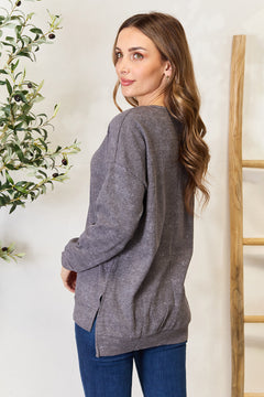 Ultimate Chic Slit Sweatshirt: Stay comfy & stylish!