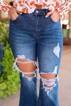 Blue Distressed Flare Jeans: '70s Retro Revival!