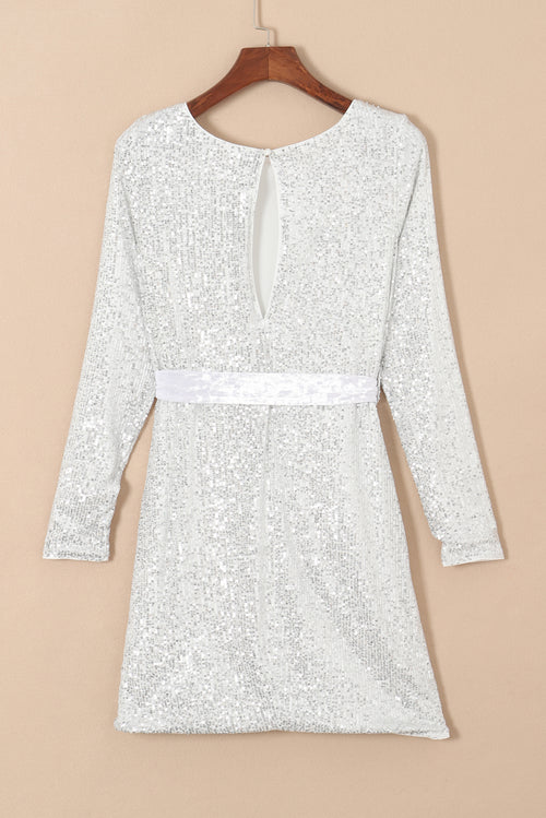 Sequin Elegance Mini Dress: Radiate Opulent Sophistication.