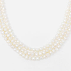 Opulent Pearl Elegance: Triple Strand Necklace