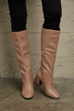 Regal Essence: Opulent Leather Knee-High Elegance