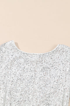 Sequin Elegance Mini Dress: Radiate Opulent Sophistication.