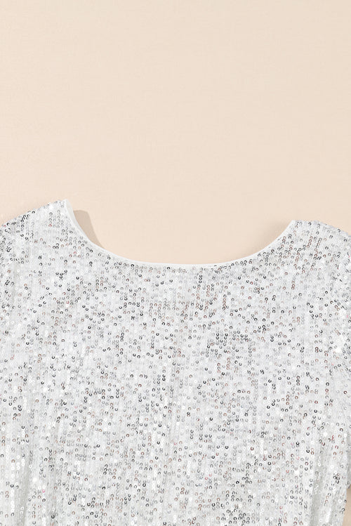 Sequin Elegance Mini Dress: Radiate Opulent Sophistication.