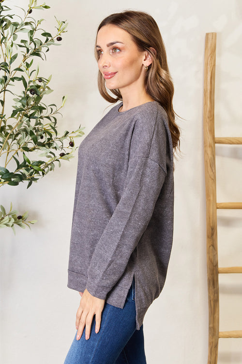 Ultimate Chic Slit Sweatshirt: Stay comfy & stylish!