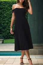 Elegant Pleated Midi Dress: Embrace Allure.