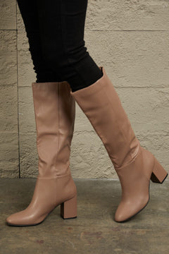 Regal Essence: Opulent Leather Knee-High Elegance