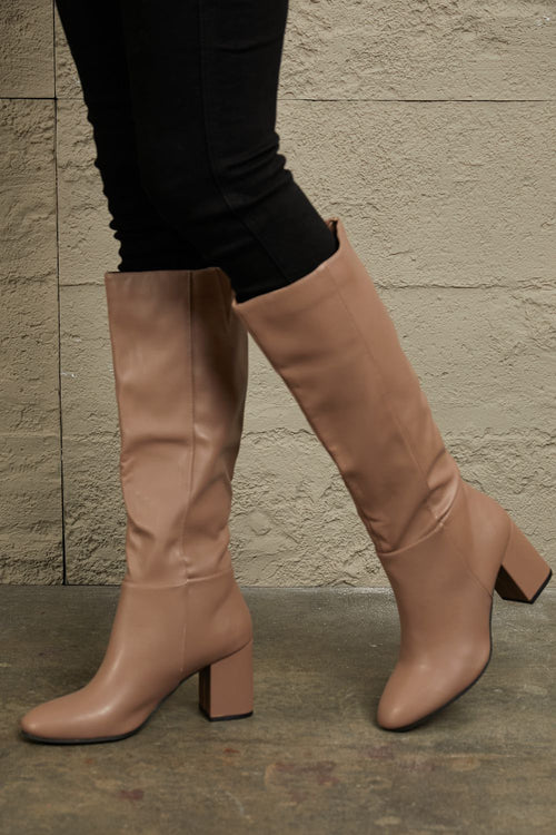 Regal Essence: Opulent Leather Knee-High Elegance