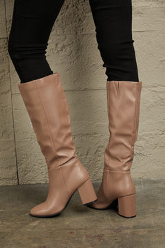 Regal Essence: Opulent Leather Knee-High Elegance