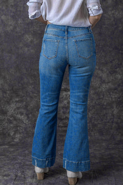 Sky Blue Distressed Flare Jeans: Retro-Chic Essential