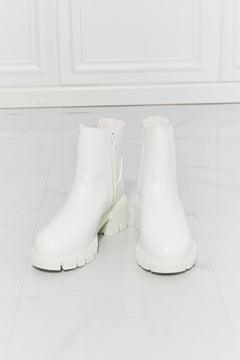 Prime Luxury: White Faux Patent Leather Boots