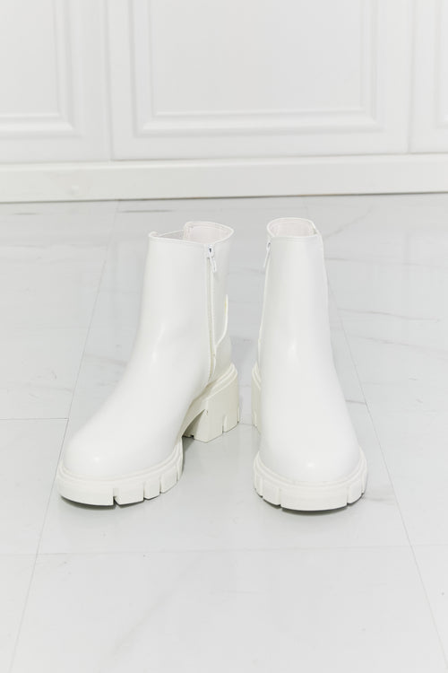 Prime Luxury: White Faux Patent Leather Boots