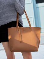 Tassel Zip Shoulder Tote: Where Style Meets Functionality