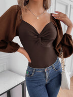 Kink V-Neck Long Sleeve Bodysuit: Elegant Sophistication